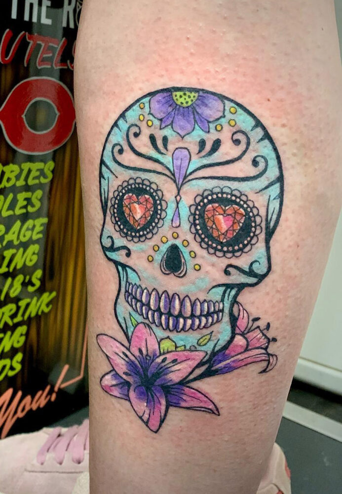 his and hers sugar skull tattoos