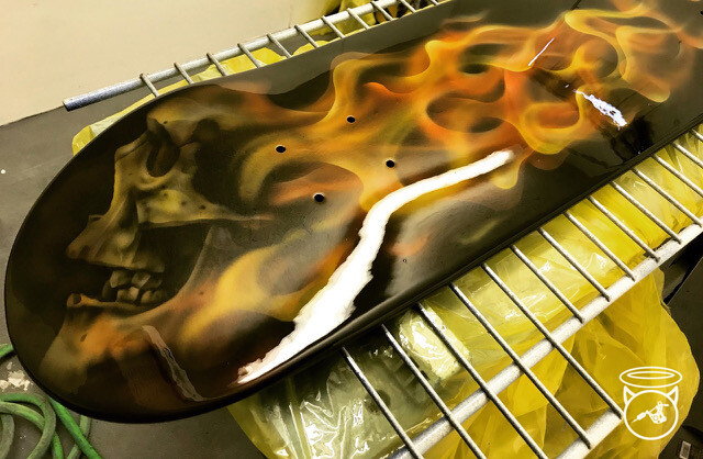 Flaming skull skate deck